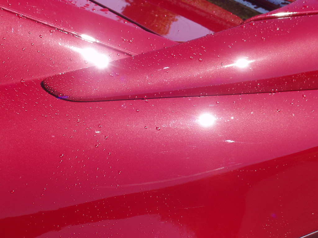 et bilde som viser effekten i lakken når det er sol. (lakken inneholder svært mye pærlemor)