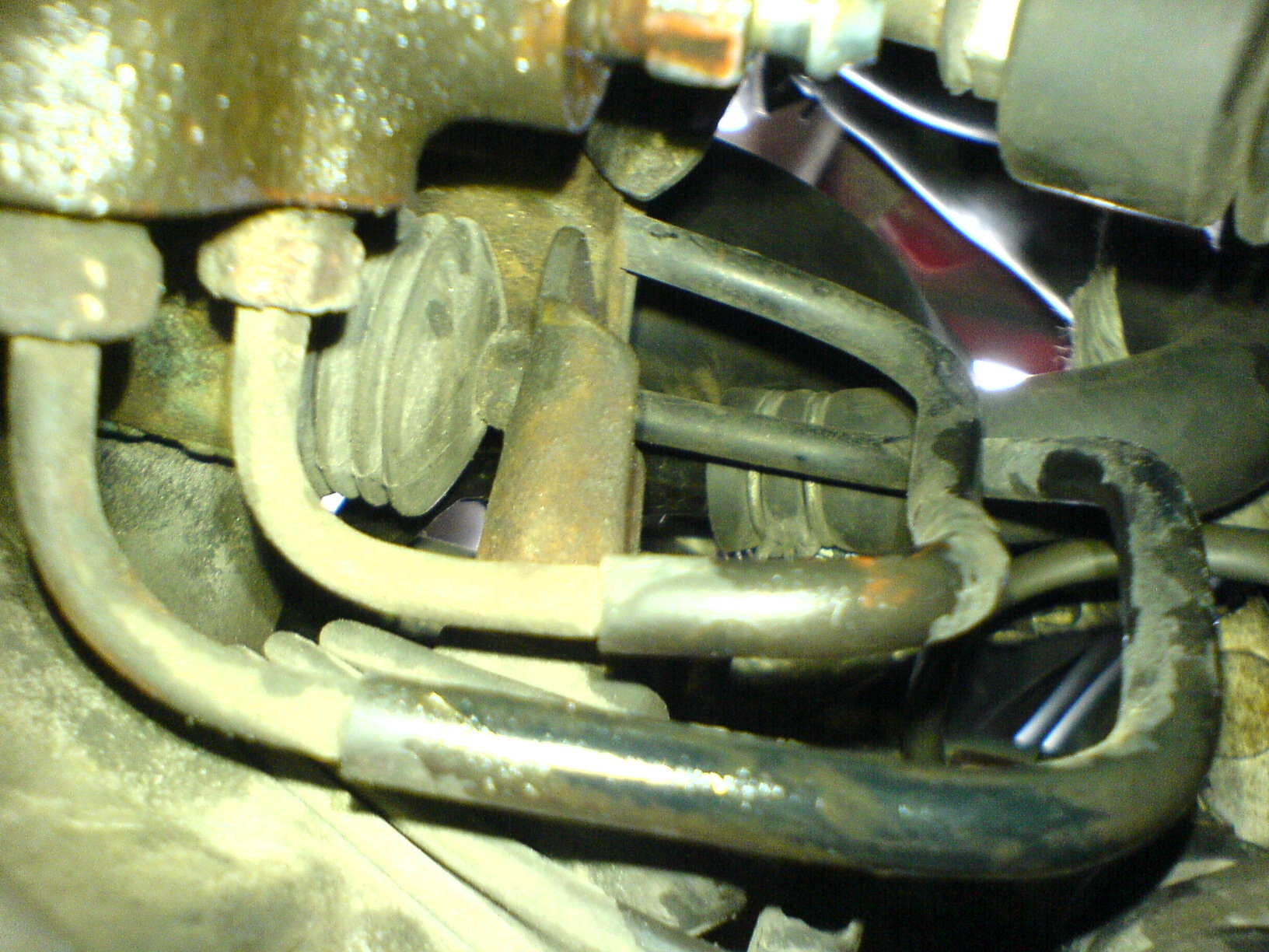 Her er utløserarmen på stedet hvil, clutchpedalen er ikke tråkket inn